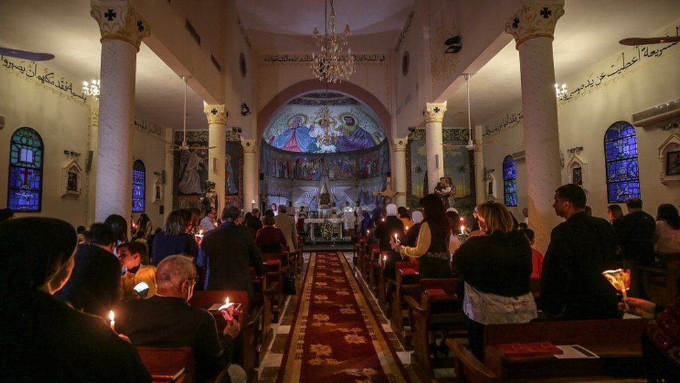 Palestinian Christians religious took part in a ceremony at Der Al-Latin Church in Gaza City