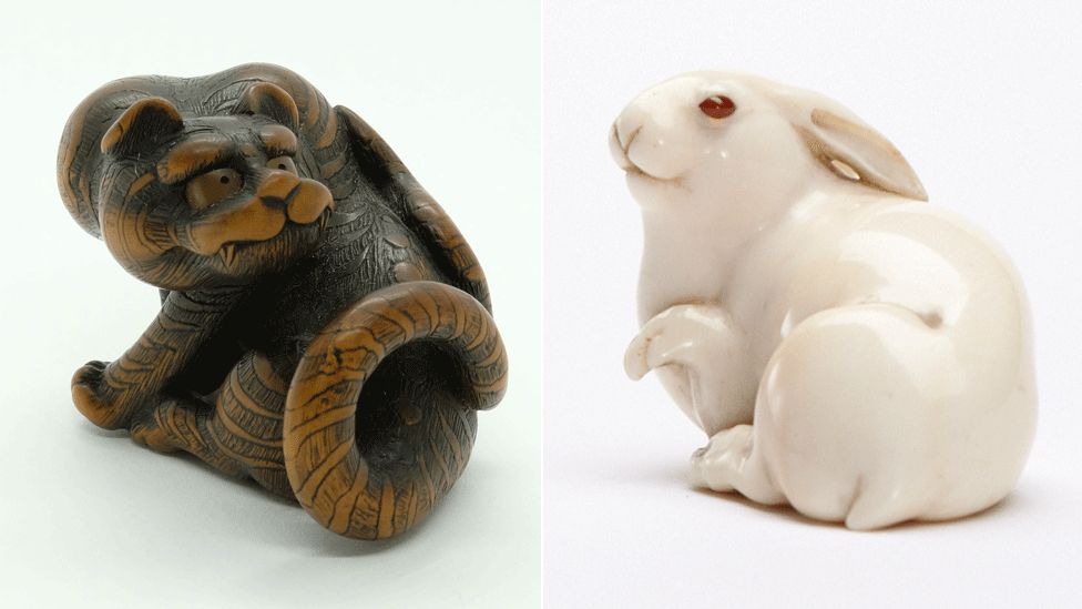 Netsuke: Male tiger and Hare with amber eyes