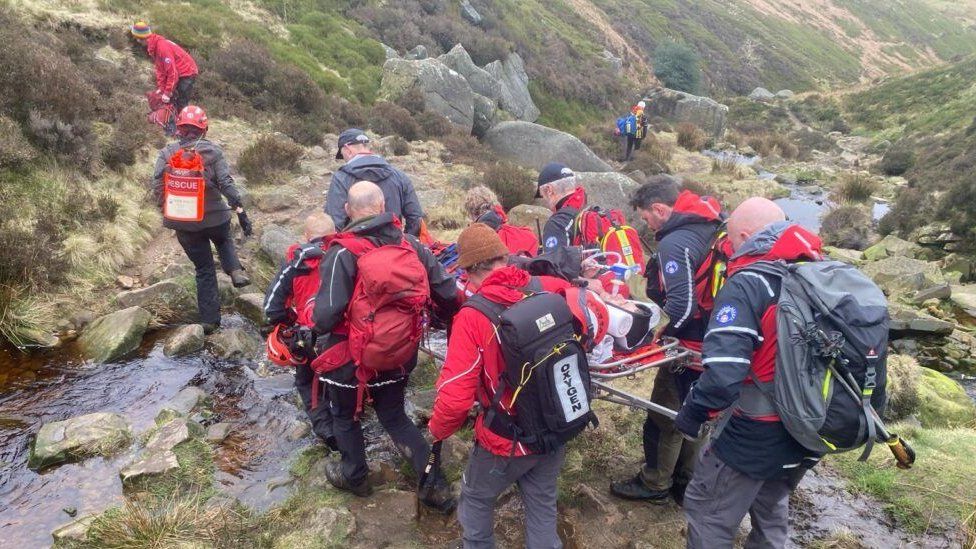Rescuers carrying a stretcher