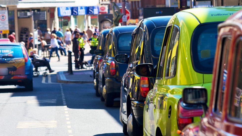 Taxis lined up in a rank in Blackpool.