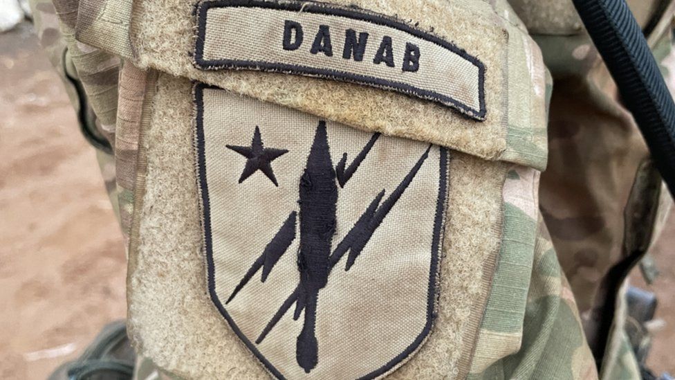 An insignia of a lightning strike on a soldier's uniform in Somalia
