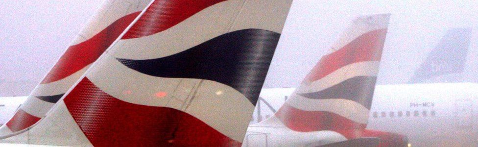 BA tail fins in the fog
