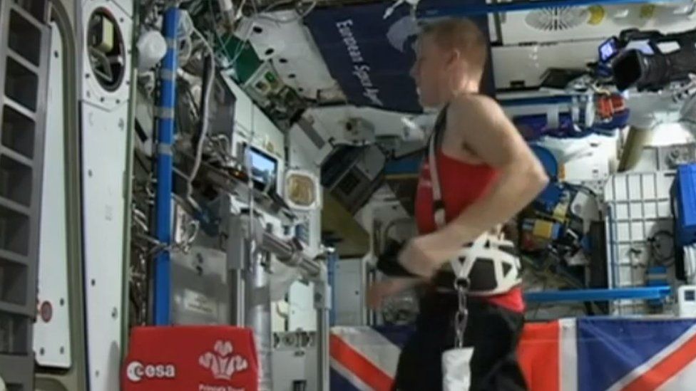 Major Tim Peake runs 26.2 miles on a treadmill in space