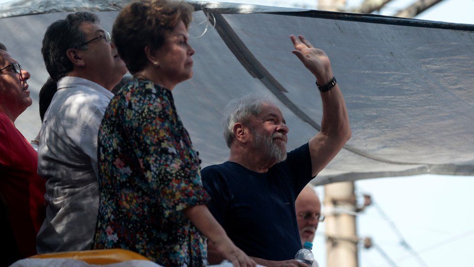 Former Brazilian President Luiz Inacio Lula da Silva waves as he attends a mass for his late wife in Sao Bernardo do Campo, Brazil, 7 April