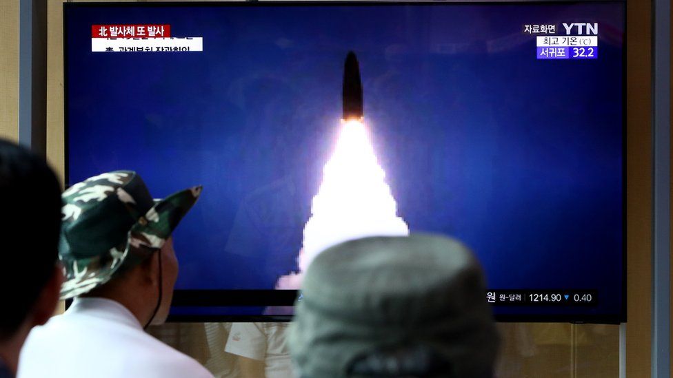Missile launch on television screen
