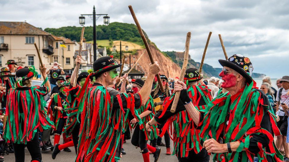 Morris dancers on the seafront at Sidmouth