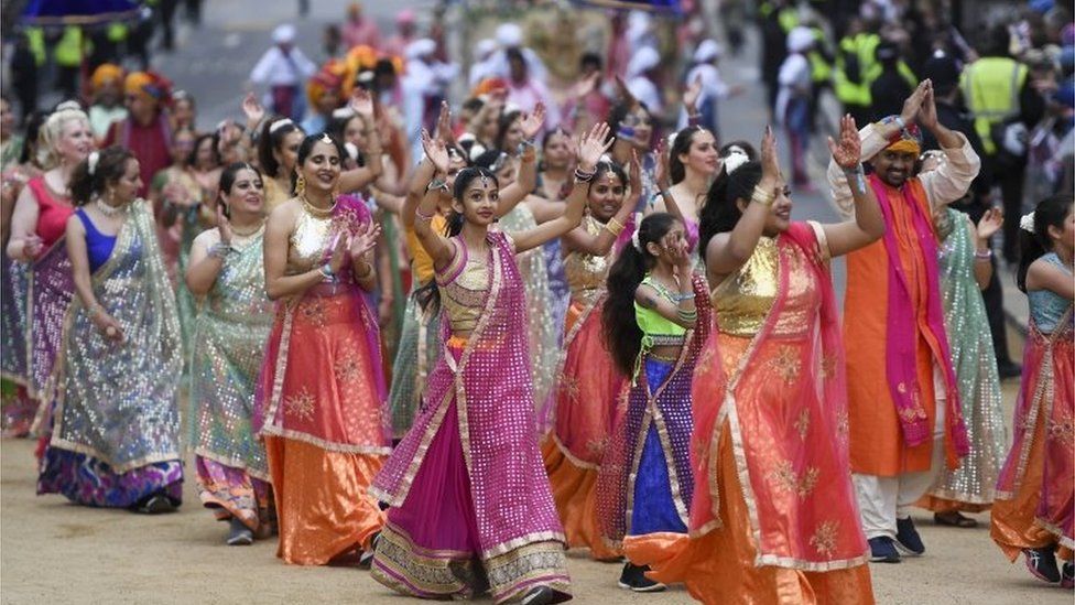 Participants performed a Bollywood wedding scene in one section of the parade