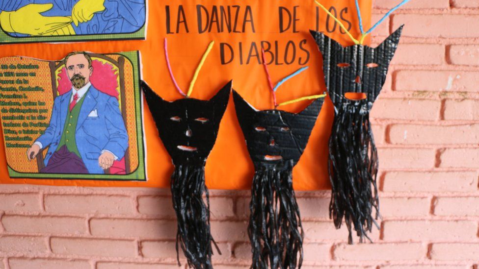Dance of the Devils display at a school