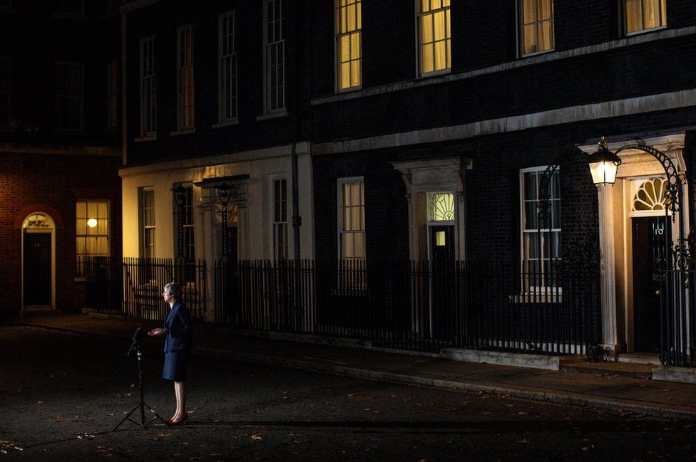 Theresa May delivers a speech outside Downing Street