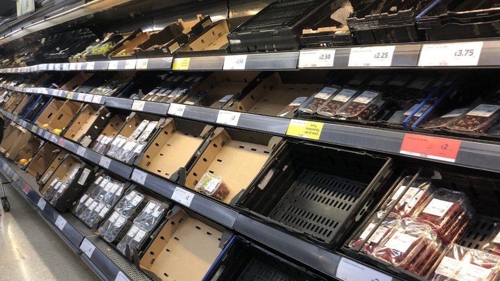 Many items were missing from the fresh food aisle at this Sainsbury's in Belfast on Monday