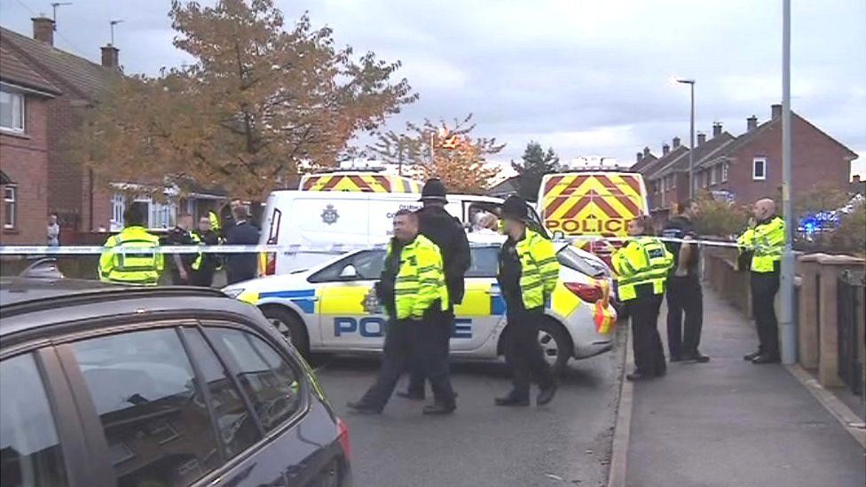 Police officers at the scene of the accident