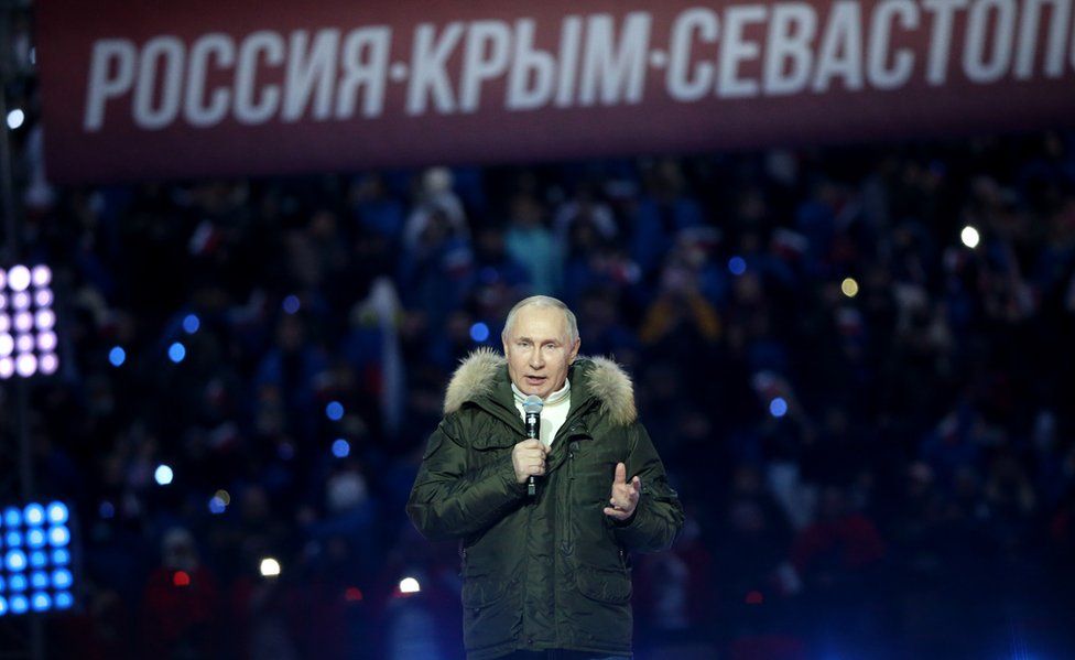 Russian President Vladimir Putin speaks during a concert marking the 7th anniversary of Crimea annexation, on March 18, 2021 in Moscow, Russia