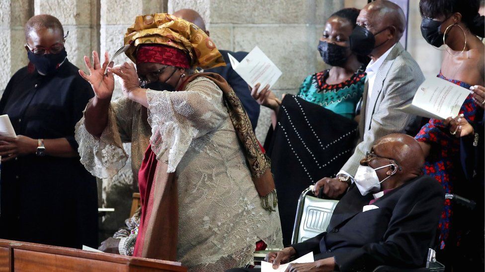 Leah Tutu dances next to her husband, Archbishop Emeritus Desmond Tutu, during a Eucharist church service to celebrate his 90th birthday, at St. George's Cathedral in Cape Town, South Africa, 7 October 2021