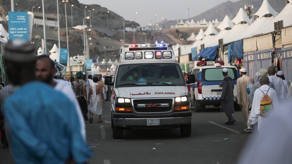 An ambulance rushes to the site where pilgrims were crushed and trampled to death during the annual Hajj pilgrimage in Mina, Saudi Arabia, Thursday, 24 September 2015.