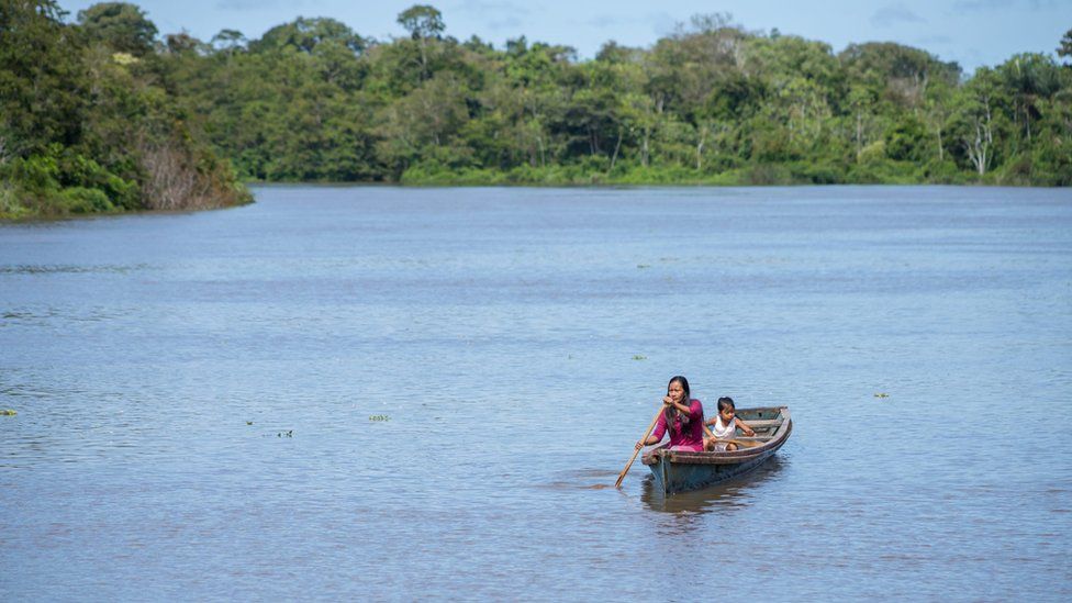Liz Chicaje Charuy paddles on the Ampiyacu river