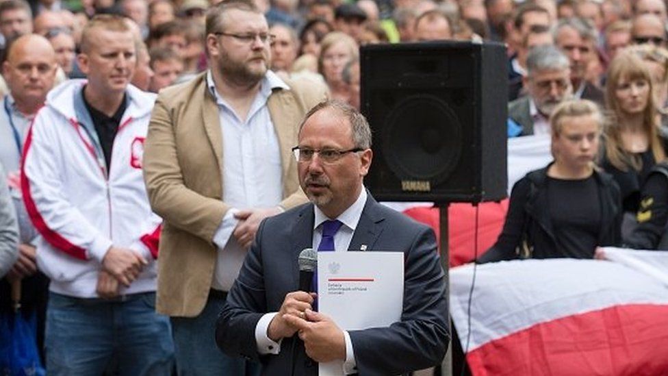 Polish Ambassador to the UK, Arkady Rzegocki at a memorial rally in Essex where a Polish man was killed.