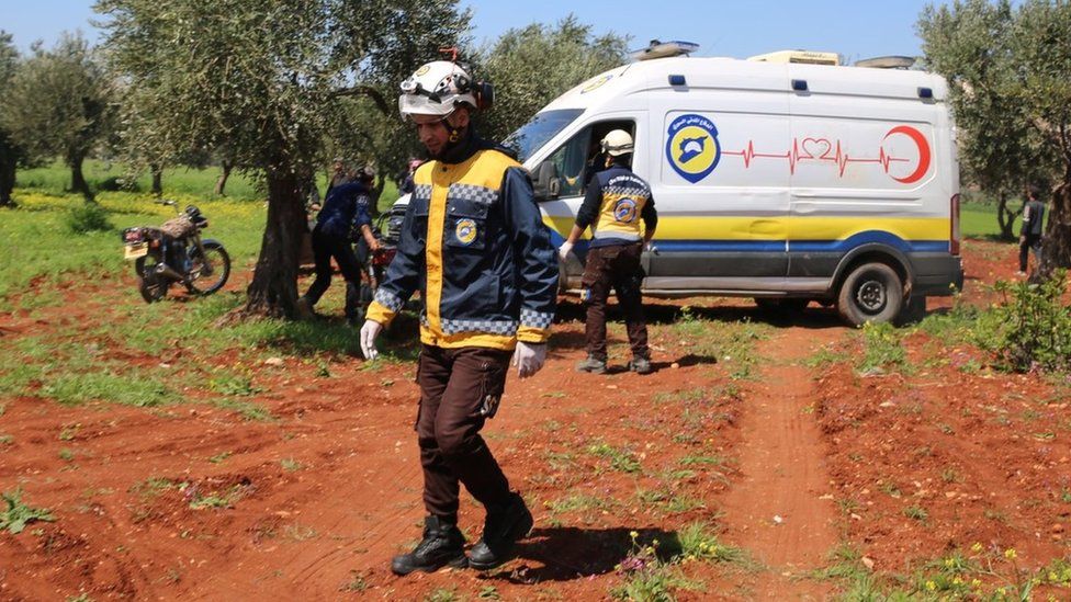 White Helmets first responders at the site of a suspected drone strike in Idlib province, Syria, that killed a man (3 April 2023)