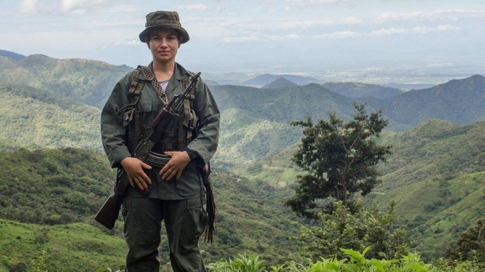 A FARC female guerrilla on guard during the days prior to their demobilization, 7 Dec 16