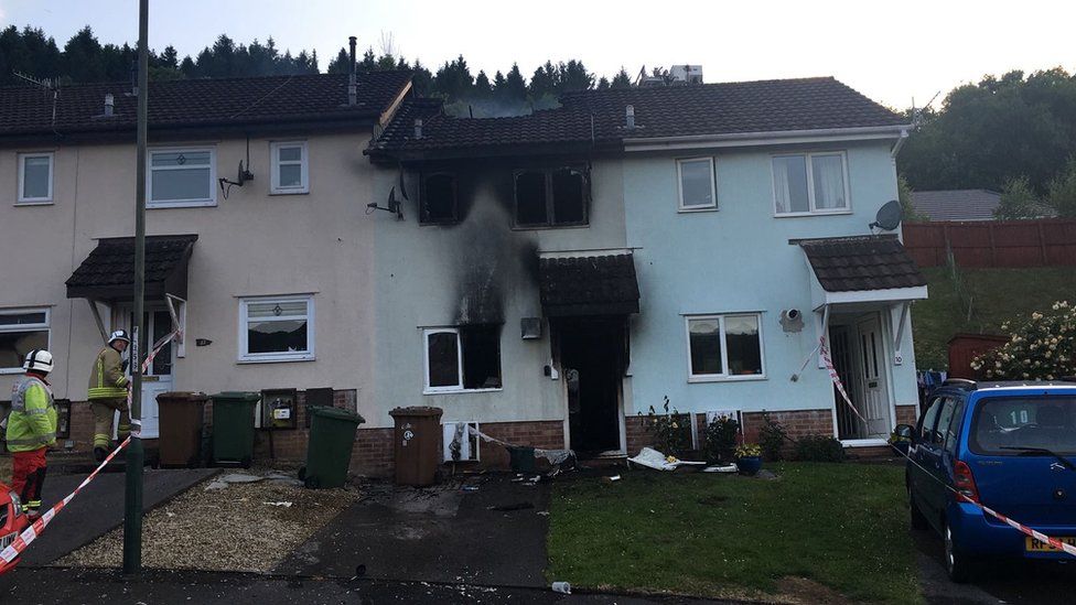 The fire-damaged house in Llanbradach