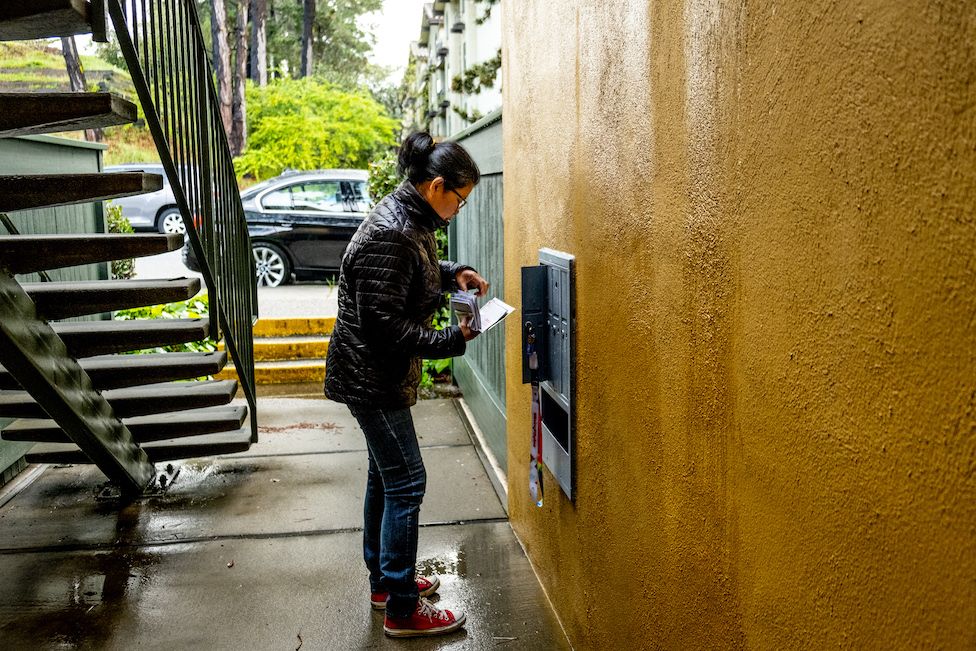 Miguel's mother takes in the mail