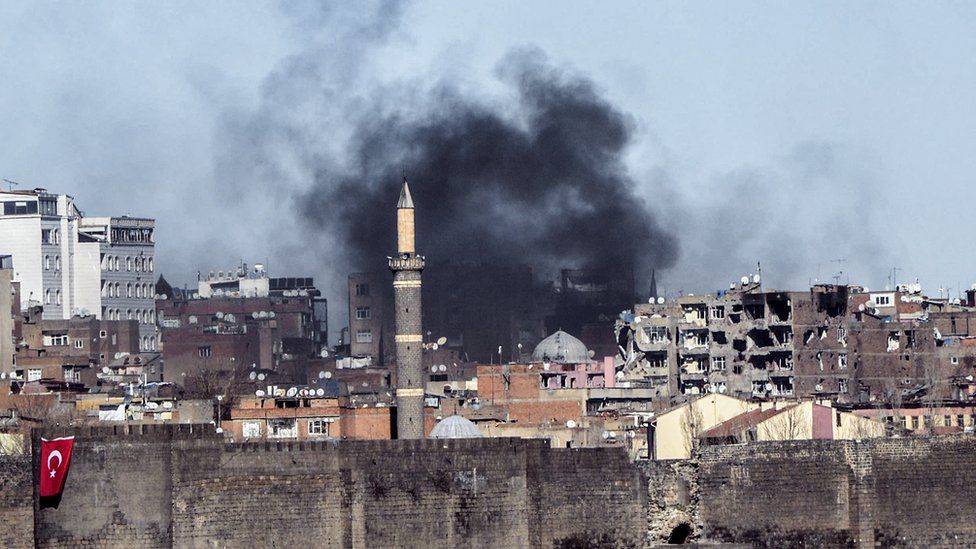 Smoke rising over the district of Sur, in the south-eastern Turkish city of Diyarbakir after clashes between Kurdish rebels and Turkish forces on 3 February.