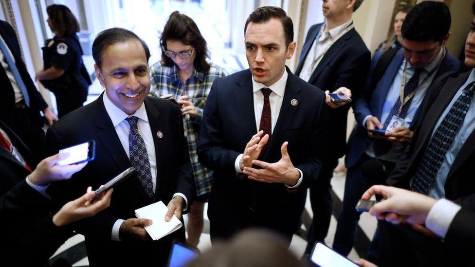 Rep. Raja Krishnamoorthi (D-IL) (L) and Rep. Mike Gallager (R-WI) talk with reporters after the House of Representatives voted on legislation they co-sponsored that could ban TikTok at the U.S. Capitol on March 13, 2024 in Washington, DC.
