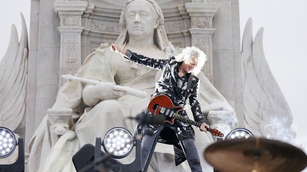 Brian May of Queen performing during the Platinum Party at the Palace staged in front of Buckingham Palace
