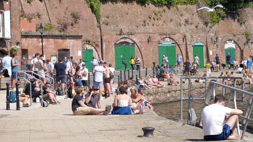 People on Exeter Quay