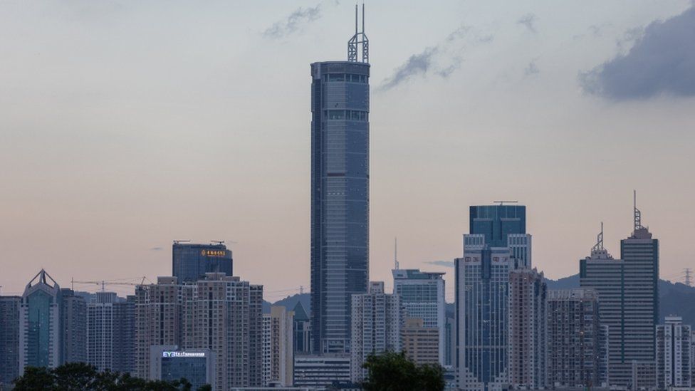 The 300m-high SEG Plaza (C) stands in Shenzhen as seen from Hong Kong, China