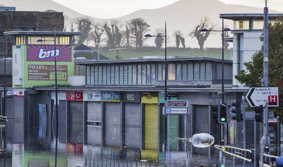 A flooded shopping street in Downpatrick