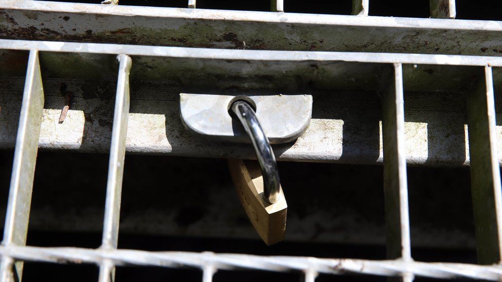A new padlock has been added to the gate at the opening of the drain behind Northwood Road