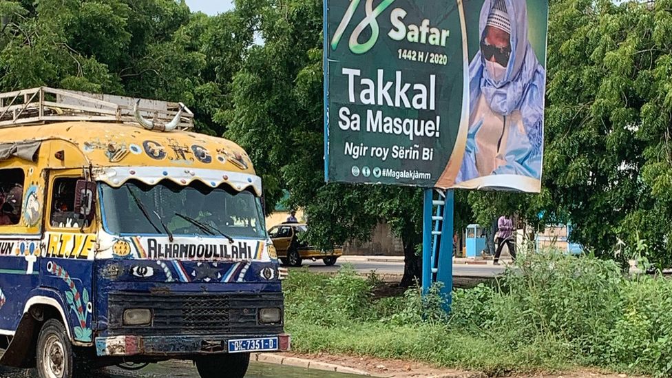 A Mouride Brotherhood sign in Dakar encouraging people to wear face masks