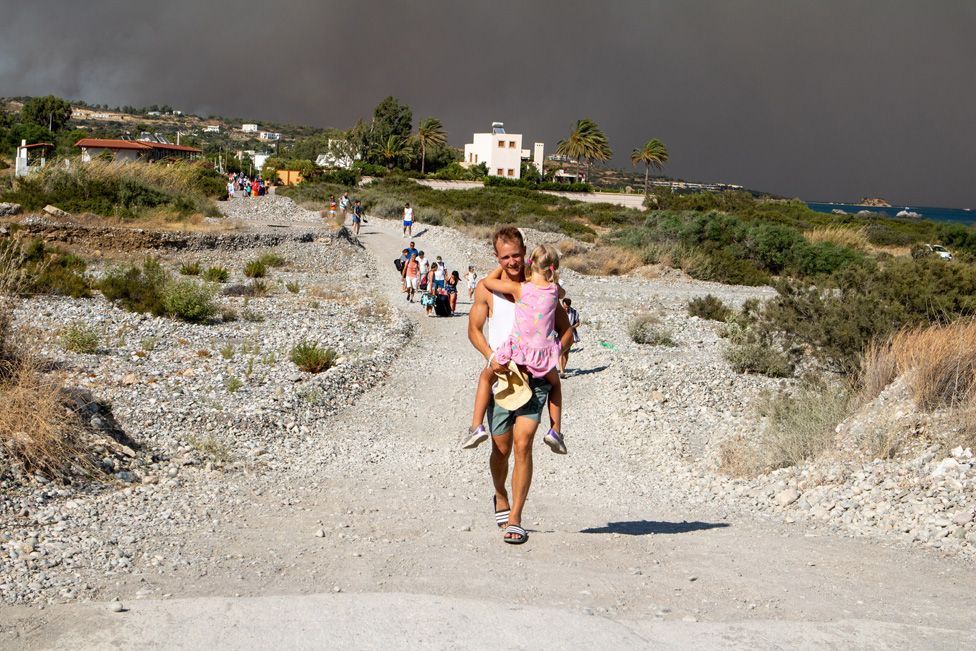 Tourists are evacuated as huge wildfire rages on Rhodeson 22 July 2023