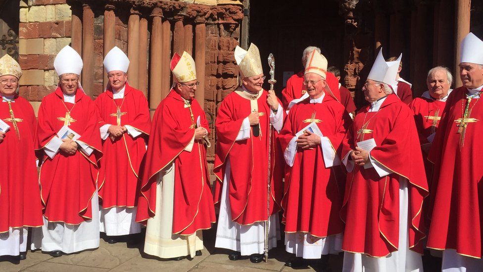 Bishops outside cathedral