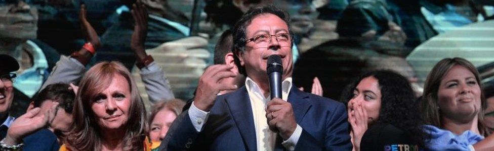 Surrounded by his family and supporters, presidential candidate Gustavo Petro (C) speaks after his defeat by conservative rival Ivan Duque in Colombia"s presidential runoff election, in Bogota, Colombia on June 17, 2018
