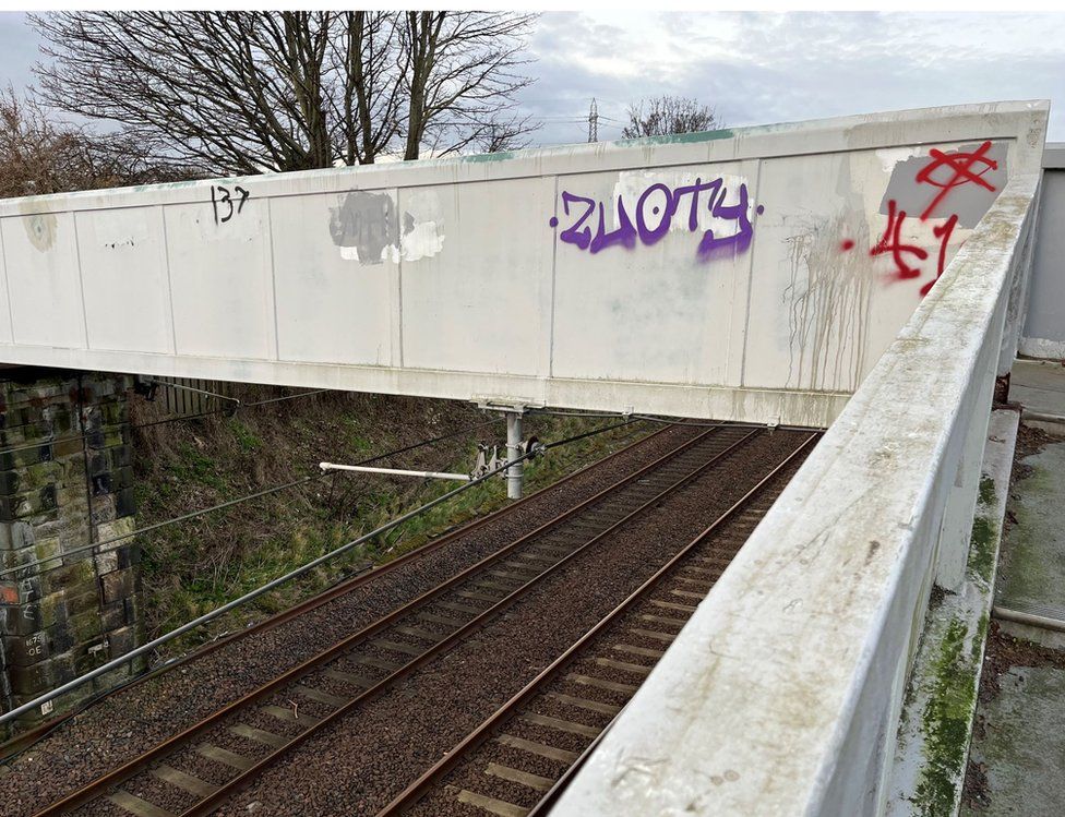 Chris Cowie is currently working on a railway bridge mural