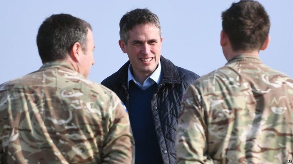 Gavin Williamson with soldiers in April