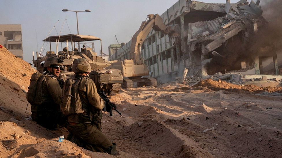 Israel Defense Forces handout photo showing Israeli soldiers hold a position during fighting inside the Gaza Strip (8 November 2023)