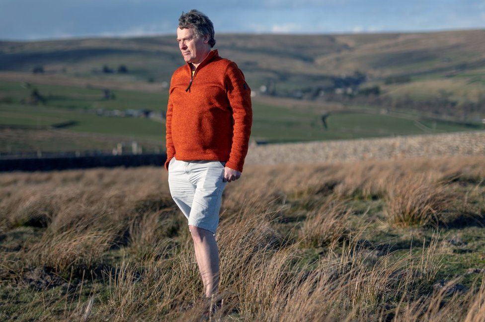 Steve Robson standing in a field