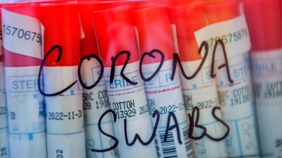 Coronavirus COVID-19 swabs from patients are kept in a plastic sealed tub as lab technicians carry out a diagnostic test for coronavirus in the microbiology laboratory inside the Specialist Virology Centre at the University Hospital of Wales in Cardiff