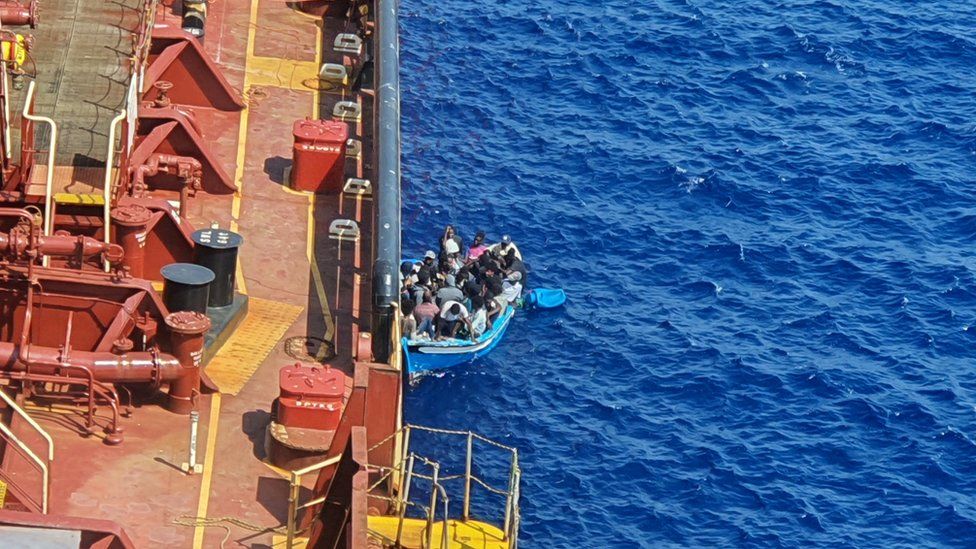 A group of migrants picked up by the Danish tanker Maersk Etienne