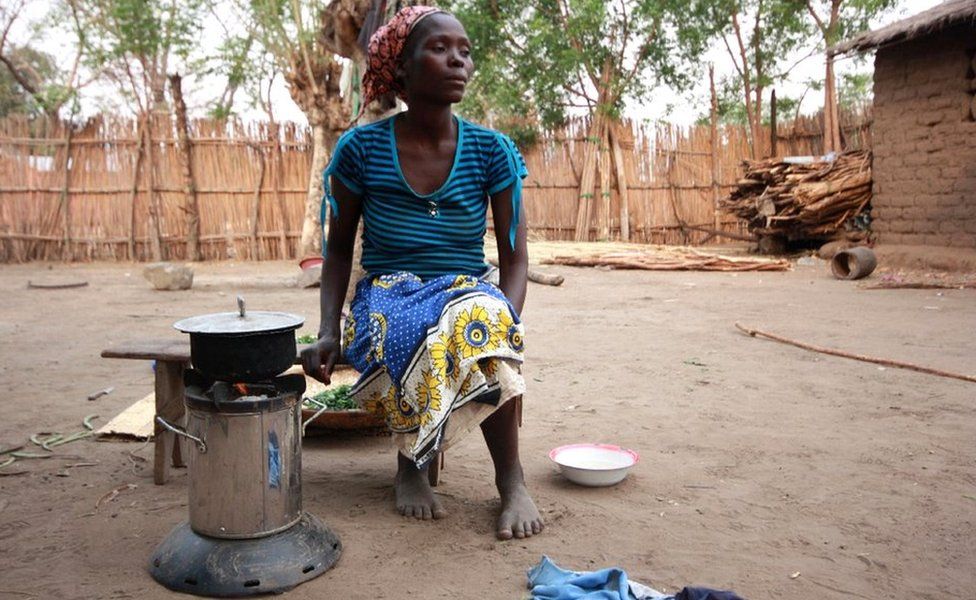 Woman with cookstove