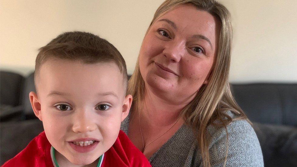 Vicki and her son Gethin in their home