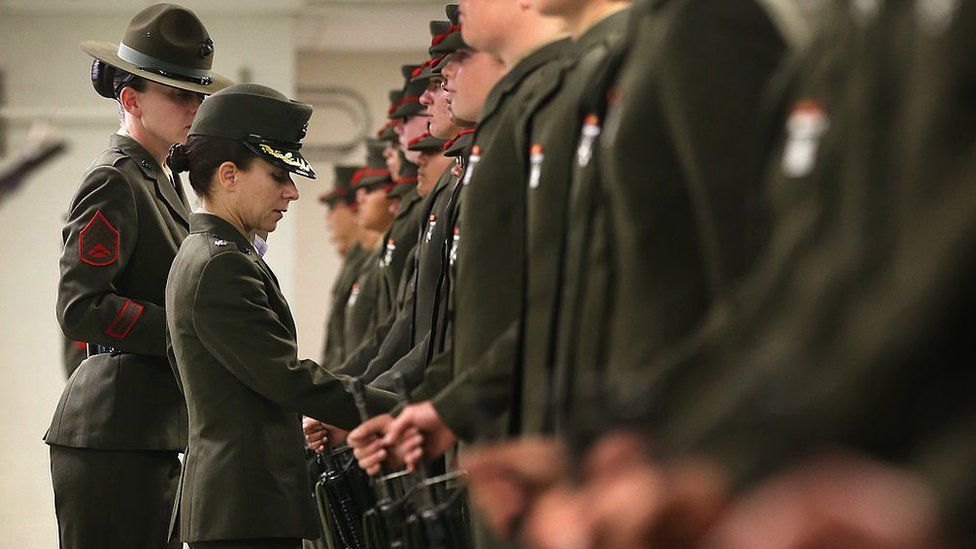 Lieutenant Colonel Gabrielle Hermes (second from Left), inspects Female Marine recruits under her command at MCRD Parris Island, South Carolina.