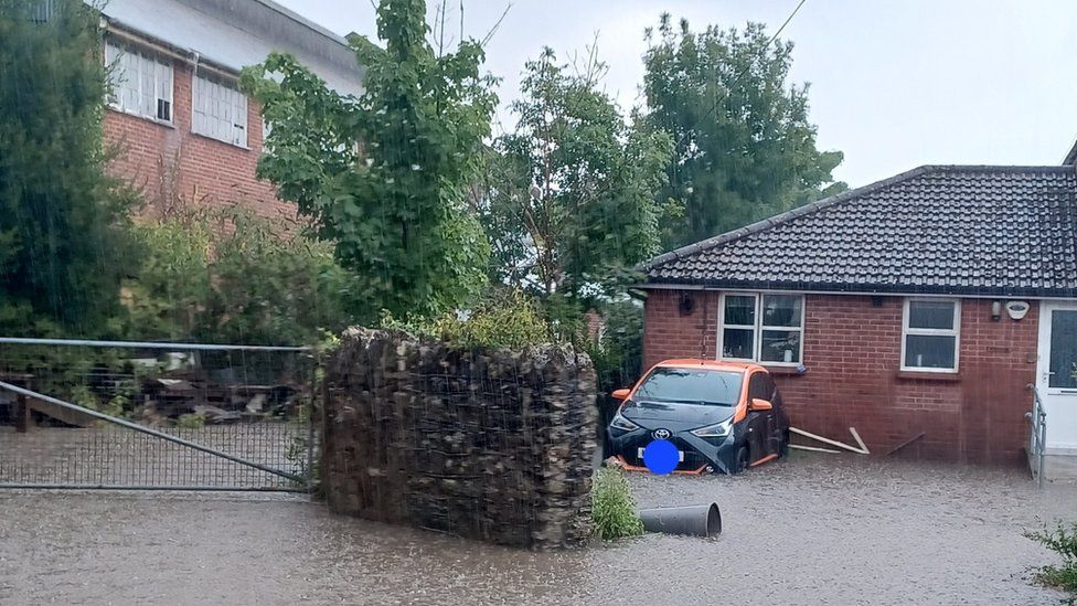 Flooding outside a house in Port Talbot, Wales