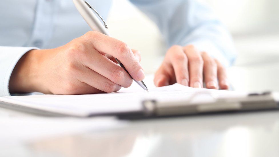 Doctor writing a letter