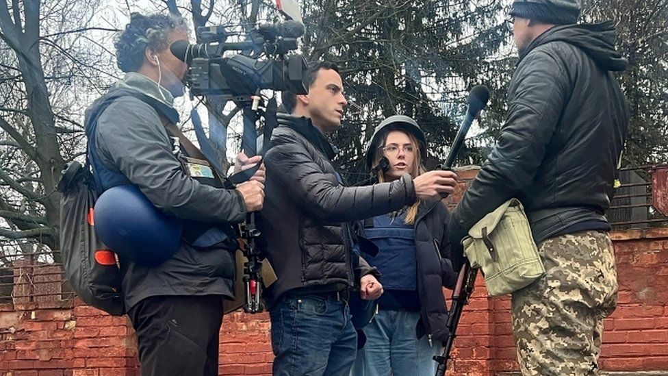 Cameraman Pierre Zakrzewski (left) and journalist Oleksandra Kuvshinova (seen here wearing a helmet and protective vest)