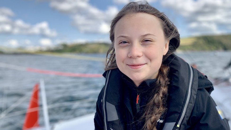 Greta Thunberg on board a solar-powered yacht Malizia II as Greta prepares to set sail from Mayflower Marina Plymouth in the UK across the Atlantic