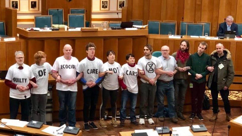 Protesters in the county council chamber