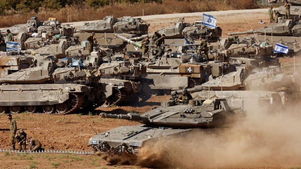 Israeli tanks adjacent   Gaza